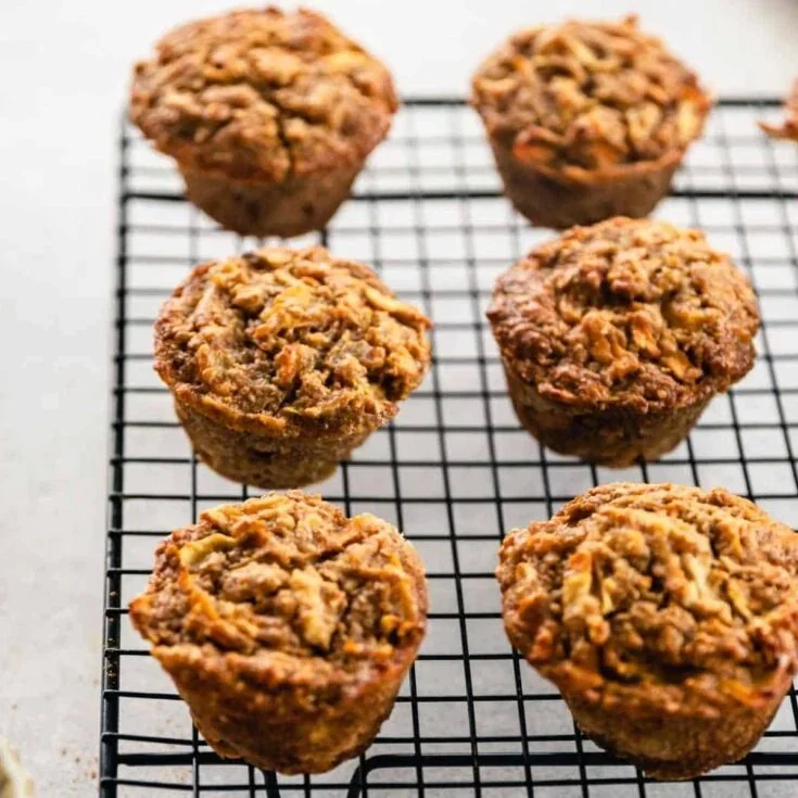 Delicious homemade ABC Muffins displayed on a wooden table.
