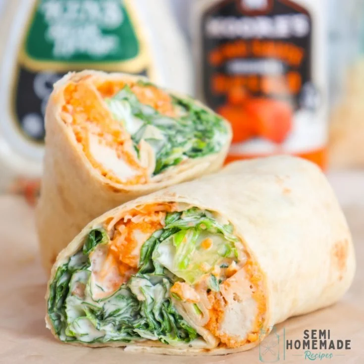 Buffalo Chicken Caesar Wraps featuring chicken, romaine lettuce, and buffalo sauce.