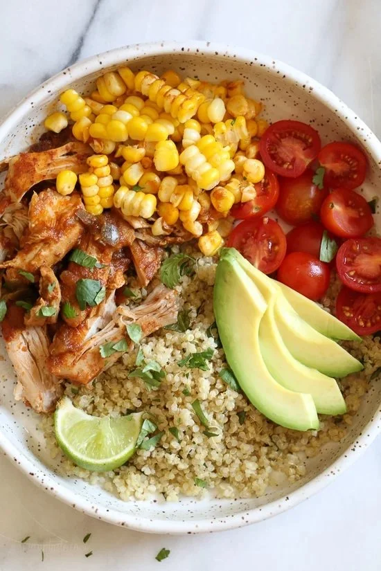 Chipotle Chicken Bowls with Quinoa topped with fresh ingredients