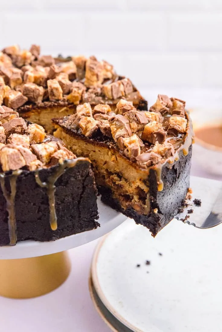 Chocolate Covered Snickers Peanut Butter Cheesecake