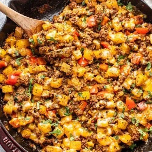 Delicious Mexican ground beef skillet with potatoes in a cast iron pan